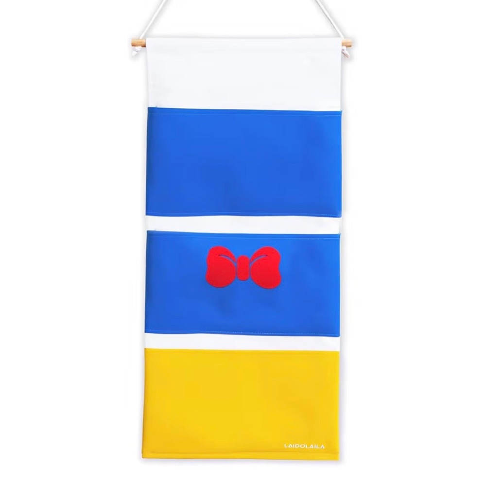 Cruise Fish Extender. Blue & Yellow Kids Hanging Organizer with Red Bow Accent